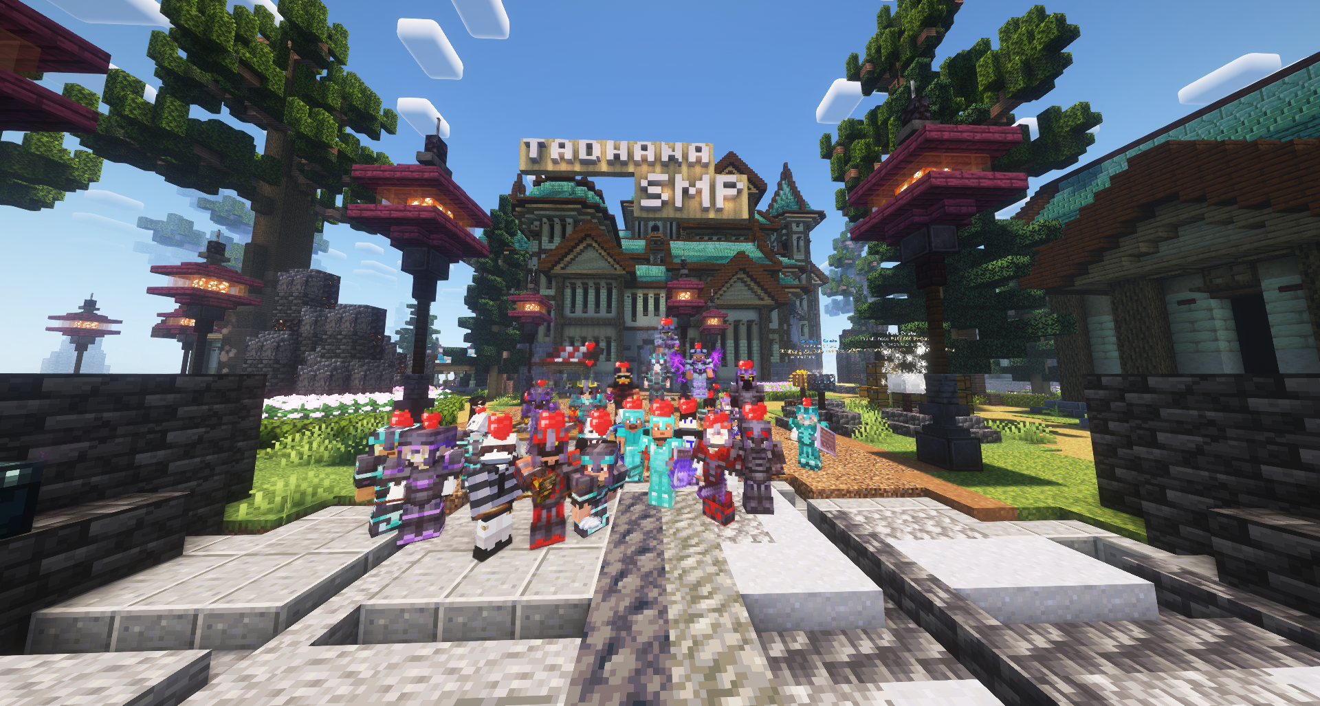 A grand purple-lit spawn city in TadhanaSMP